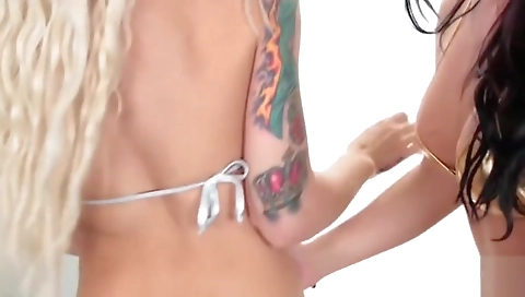 Trans women get a big cock and a handjob from one another